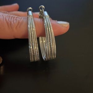 Shiny metal hanging earrings